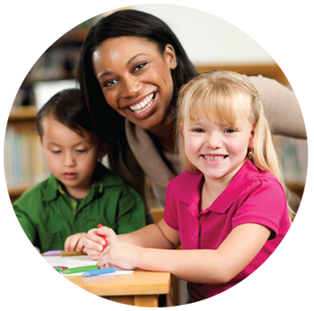 Happy teacher in the classroom