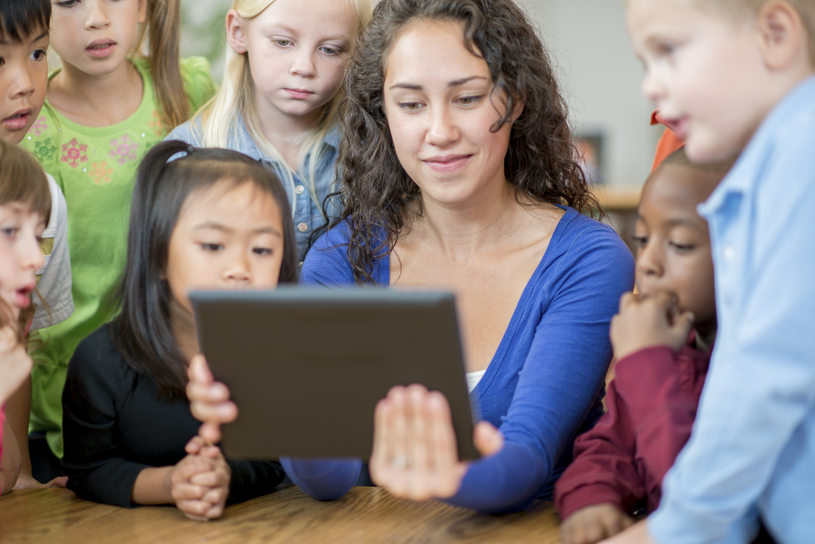Happy teacher in the classroom